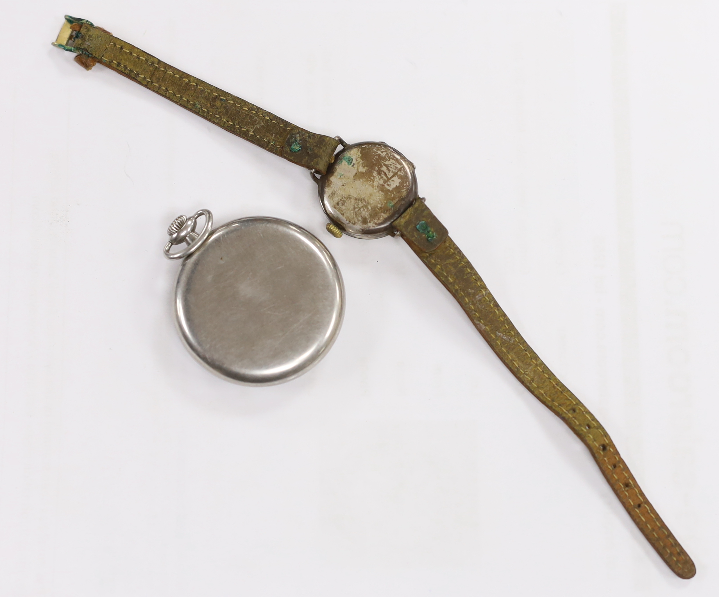 A chromium cased Zenith black dial keyless pocket watch and a silver wrist watch.